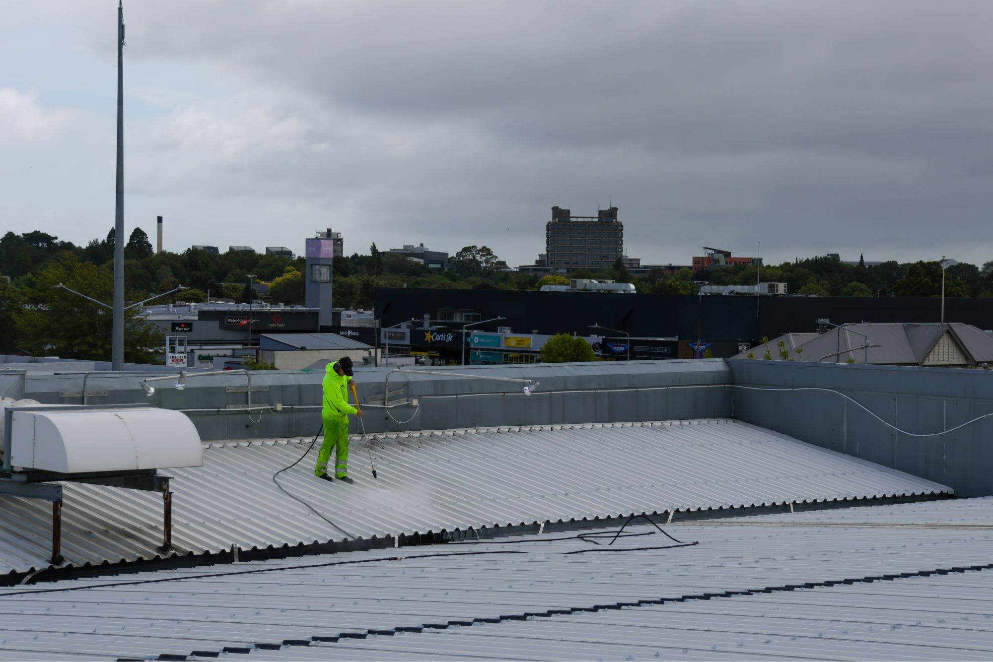 Protective roof coating application