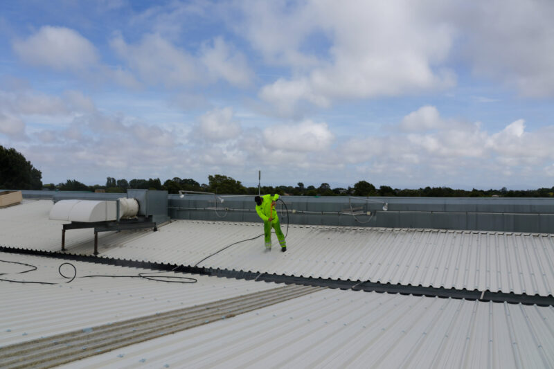 Commercial roof washdown in progress